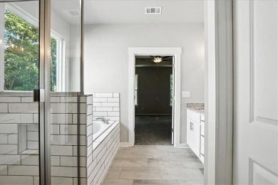 ONLY A FEW HOMES REMAIN IN THE LINKS SECTION OF TRADITOINS OF on Traditions of Braselton Golf Club in Georgia - for sale on GolfHomes.com, golf home, golf lot
