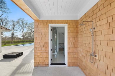 Down a perfectly manicured private road, discover 171 Oneck Lane on Westhampton Country Club in New York - for sale on GolfHomes.com, golf home, golf lot