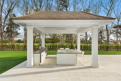 Down a perfectly manicured private road, discover 171 Oneck Lane on Westhampton Country Club in New York - for sale on GolfHomes.com, golf home, golf lot