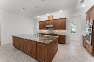 A RARE FIND! THE AVANTI LUXURY MODEL BY TOLL BROTHERS ON A on Eagle Creek Golf Club in Florida - for sale on GolfHomes.com, golf home, golf lot