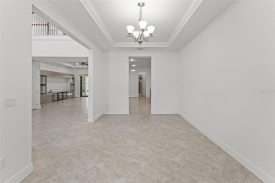A RARE FIND! THE AVANTI LUXURY MODEL BY TOLL BROTHERS ON A on Eagle Creek Golf Club in Florida - for sale on GolfHomes.com, golf home, golf lot