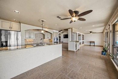 Welcome to your dream waterfront retreat in Cedar Creek Country on Cedar Creek Country Club in Texas - for sale on GolfHomes.com, golf home, golf lot