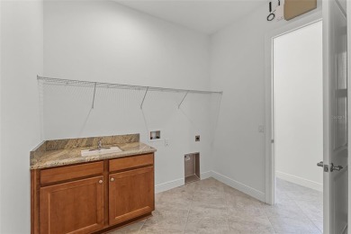A RARE FIND! THE AVANTI LUXURY MODEL BY TOLL BROTHERS ON A on Eagle Creek Golf Club in Florida - for sale on GolfHomes.com, golf home, golf lot
