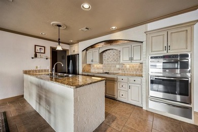 Welcome to your dream waterfront retreat in Cedar Creek Country on Cedar Creek Country Club in Texas - for sale on GolfHomes.com, golf home, golf lot