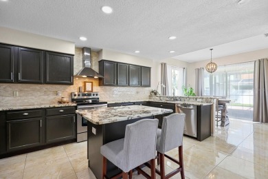 Welcome to this stunning executive home nestled in a gated on The Eagles Golf Course and Club in Florida - for sale on GolfHomes.com, golf home, golf lot