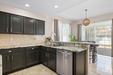 Welcome to this stunning executive home nestled in a gated on The Eagles Golf Course and Club in Florida - for sale on GolfHomes.com, golf home, golf lot
