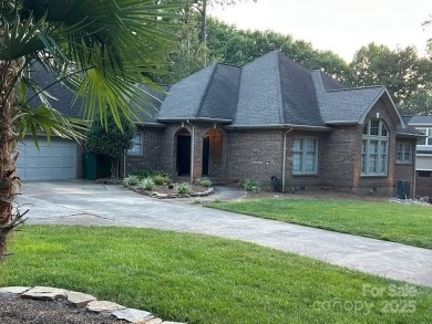 Exciting Opportunity in Cowans Ford. Rare 1 level Full Brick on Cowans Ford Country Club in North Carolina - for sale on GolfHomes.com, golf home, golf lot
