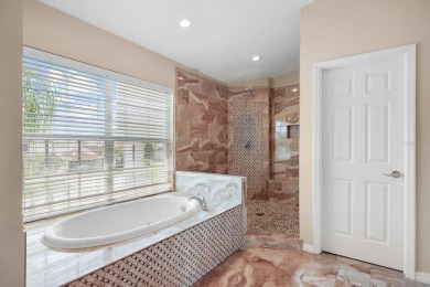 Welcome to this stunning executive home nestled in a gated on The Eagles Golf Course and Club in Florida - for sale on GolfHomes.com, golf home, golf lot