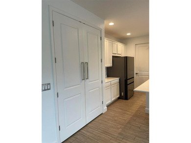 Discover this exceptional residence in the exclusive, Private on Deer Island Country Club in Florida - for sale on GolfHomes.com, golf home, golf lot