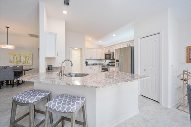 RELAXING GOLF AND WATER VIEWS in Sunset Pointe!  This EXPANDED on Glenview Championship Golf and Country Club in Florida - for sale on GolfHomes.com, golf home, golf lot