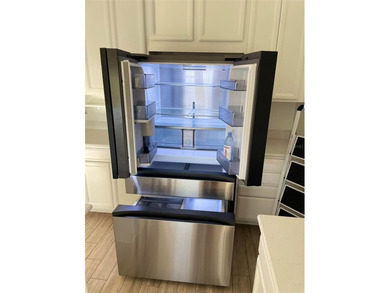 Discover this exceptional residence in the exclusive, Private on Deer Island Country Club in Florida - for sale on GolfHomes.com, golf home, golf lot