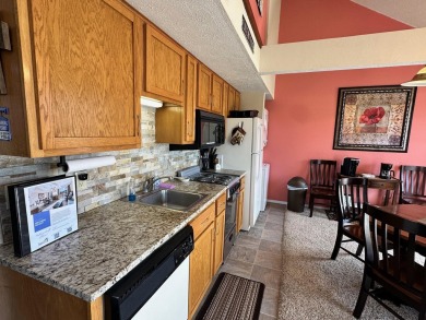 This stunning 2 bed/2 bath condo is fully turnkey and ready for on Pointe Royale Village Country Club in Missouri - for sale on GolfHomes.com, golf home, golf lot