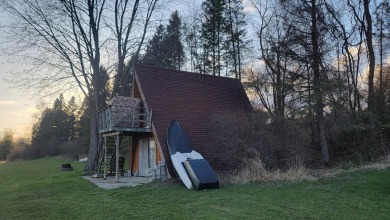 Extremely hard to find 90 Contiguous Acres with frontage on 2 on Holland Lake Golf Course Inc. in Michigan - for sale on GolfHomes.com, golf home, golf lot