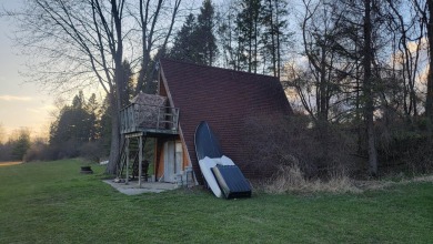 Extremely hard to find 90 Contiguous Acres with frontage on 2 on Holland Lake Golf Course Inc. in Michigan - for sale on GolfHomes.com, golf home, golf lot