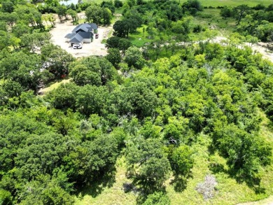 Nestled in the highly sought-after High Point Estates on Sulphur Springs Country Club in Texas - for sale on GolfHomes.com, golf home, golf lot