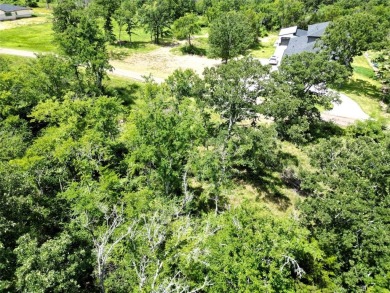 Nestled in the highly sought-after High Point Estates on Sulphur Springs Country Club in Texas - for sale on GolfHomes.com, golf home, golf lot