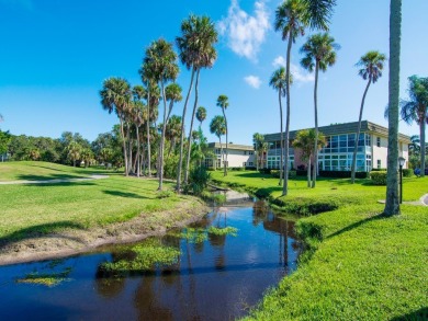 Expansive scenic views of the golf course, lakes and abundant on Vero Beach South Golf Course in Florida - for sale on GolfHomes.com, golf home, golf lot