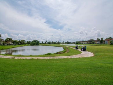 Expansive scenic views of the golf course, lakes and abundant on Vero Beach South Golf Course in Florida - for sale on GolfHomes.com, golf home, golf lot