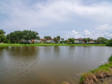 Expansive scenic views of the golf course, lakes and abundant on Vero Beach South Golf Course in Florida - for sale on GolfHomes.com, golf home, golf lot