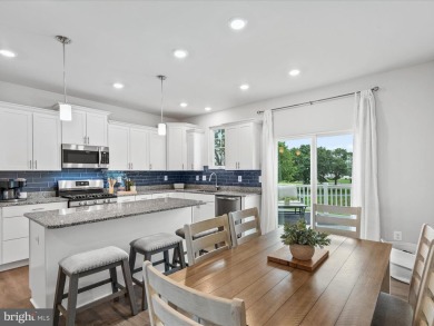 Welcome to 24325 Cassville Lane, a beautiful 3-story End Unit on Plantation Lakes Golf and Country Club in Delaware - for sale on GolfHomes.com, golf home, golf lot