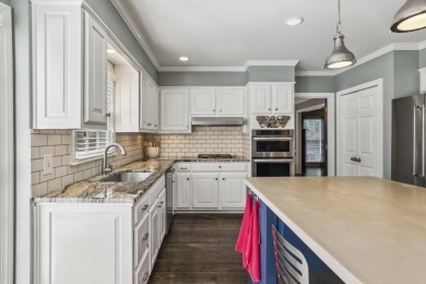 Located in the desirable Glastonberry swim/tennis community on Rivermont Golf and Country Club in Georgia - for sale on GolfHomes.com, golf home, golf lot