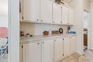 Welcome home to this well-loved, fully furnished 2-bedroom on Lake Henry Golf Club in Florida - for sale on GolfHomes.com, golf home, golf lot