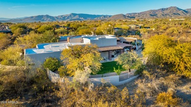There's a reason certain homes sell themselves. This 1.5-acre on The Boulders Resort Golf Club in Arizona - for sale on GolfHomes.com, golf home, golf lot