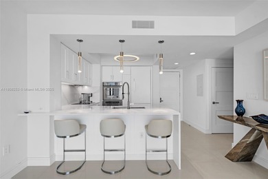 Enjoy ocean & city views from the expansive terrace of this on Coral Ridge Country Club in Florida - for sale on GolfHomes.com, golf home, golf lot