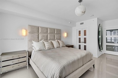 Enjoy ocean & city views from the expansive terrace of this on Coral Ridge Country Club in Florida - for sale on GolfHomes.com, golf home, golf lot