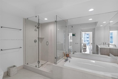 Enjoy ocean & city views from the expansive terrace of this on Coral Ridge Country Club in Florida - for sale on GolfHomes.com, golf home, golf lot