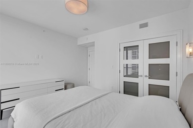 Enjoy ocean & city views from the expansive terrace of this on Coral Ridge Country Club in Florida - for sale on GolfHomes.com, golf home, golf lot