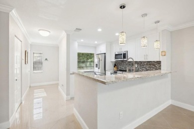 This captivating condo in the highly desirable Boca Lago on Boca Lago Golf and Country Club in Florida - for sale on GolfHomes.com, golf home, golf lot