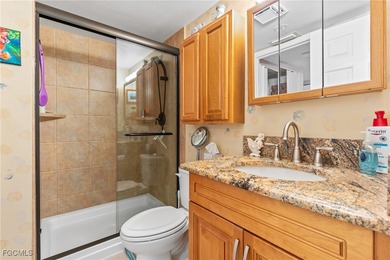 Welcome to this beautifully updated, top-floor penthouse located on Seven Lakes Golf and Tennis Community in Florida - for sale on GolfHomes.com, golf home, golf lot