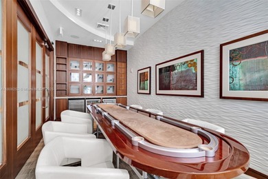 Enjoy ocean & city views from the expansive terrace of this on Coral Ridge Country Club in Florida - for sale on GolfHomes.com, golf home, golf lot