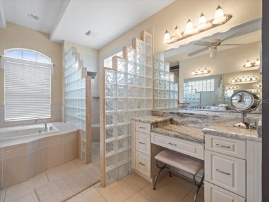 Beautifully updated 2003 Addison Custom pool home on .31 acre on Glen Lakes Country Club in Florida - for sale on GolfHomes.com, golf home, golf lot