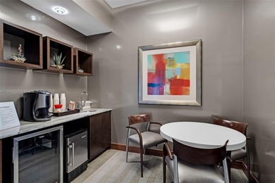 Enjoy ocean & city views from the expansive terrace of this on Coral Ridge Country Club in Florida - for sale on GolfHomes.com, golf home, golf lot