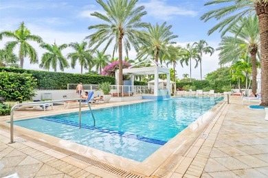 Enjoy ocean & city views from the expansive terrace of this on Coral Ridge Country Club in Florida - for sale on GolfHomes.com, golf home, golf lot