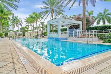 Enjoy ocean & city views from the expansive terrace of this on Coral Ridge Country Club in Florida - for sale on GolfHomes.com, golf home, golf lot