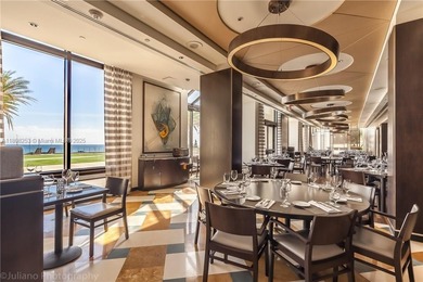 Enjoy ocean & city views from the expansive terrace of this on Coral Ridge Country Club in Florida - for sale on GolfHomes.com, golf home, golf lot