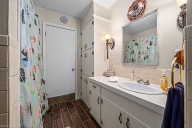 Welcome to your private retreat! This charming 3-bedroom on Ben Geren Regional Park Golf Courses in Arkansas - for sale on GolfHomes.com, golf home, golf lot