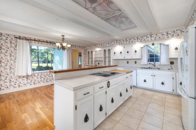 This amazing custom-built Mediterranean style home sits on two on Santee-Cooper Country Club in South Carolina - for sale on GolfHomes.com, golf home, golf lot