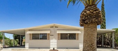 This charming 3-bedroom, 1.75-bath home is nestled on a quiet on Fountain of the Sun Country Club in Arizona - for sale on GolfHomes.com, golf home, golf lot