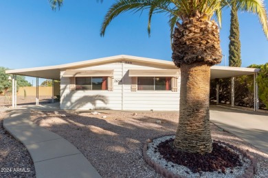 This charming 3-bedroom, 1.75-bath home is nestled on a quiet on Fountain of the Sun Country Club in Arizona - for sale on GolfHomes.com, golf home, golf lot