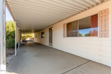 This charming 3-bedroom, 1.75-bath home is nestled on a quiet on Fountain of the Sun Country Club in Arizona - for sale on GolfHomes.com, golf home, golf lot