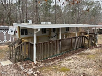 Excellent opportunity to own this double lot with a beautiful on River Golf and County Club at Lake Royale in North Carolina - for sale on GolfHomes.com, golf home, golf lot