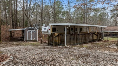 Excellent opportunity to own this double lot with a beautiful on River Golf and County Club at Lake Royale in North Carolina - for sale on GolfHomes.com, golf home, golf lot