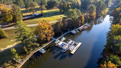 This amazing custom-built Mediterranean style home sits on two on Santee-Cooper Country Club in South Carolina - for sale on GolfHomes.com, golf home, golf lot