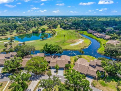 This is the one * TOTALLY REMODELED END UNIT WITH A NEW ROOF * on Bent Tree Country Club in Florida - for sale on GolfHomes.com, golf home, golf lot