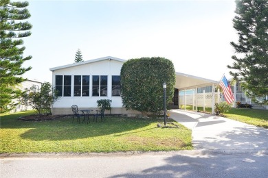 Spacious, well-maintained home with wide open floor plan. Lovely on Barefoot Bay Golf Course in Florida - for sale on GolfHomes.com, golf home, golf lot