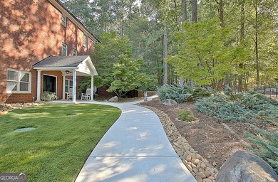 A SWEETHEART of a DEAL! You will not want to miss this home, it on Whitewater Creek in Georgia - for sale on GolfHomes.com, golf home, golf lot